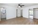Bright bedroom featuring modern ceiling fan, and doors to bathroom and closet at 2112 Los Altos St, Las Vegas, NV 89102