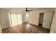 Bedroom boasts wood-look floors, a ceiling fan, and a closet at 2112 Los Altos St, Las Vegas, NV 89102