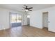 Bright bedroom featuring sliding glass door, ceiling fan, and closet for ample storage at 2112 Los Altos St, Las Vegas, NV 89102