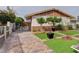 Spacious brick driveway leads to an iron gate and manicured front yard at 2112 Los Altos St, Las Vegas, NV 89102