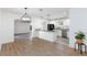 Open kitchen featuring stainless appliances, granite counters and modern pendant lighting at 2112 Los Altos St, Las Vegas, NV 89102