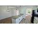 Bright, modern kitchen with granite counters, white cabinets, and open layout to living area at 2112 Los Altos St, Las Vegas, NV 89102