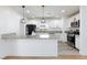 Updated kitchen with granite countertops, modern appliances, and pendant lights at 2112 Los Altos St, Las Vegas, NV 89102