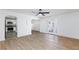 Bright, open living room with modern floors and a view into the updated kitchen at 2112 Los Altos St, Las Vegas, NV 89102