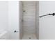 Modern shower with stone look tile, and chrome hardware at 2112 Los Altos St, Las Vegas, NV 89102