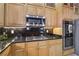 Contemporary kitchen design with granite countertops and modern appliances at 2197 Big Bar Dr, Henderson, NV 89052