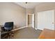 Office space with carpet, fan, and a view of the closet at 2197 Big Bar Dr, Henderson, NV 89052