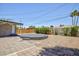 Large backyard with a unique circular platform, perfect for entertaining or creating an outdoor living space at 2313 Van Patten Pl, Las Vegas, NV 89104