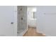 En Suite bathroom featuring tile shower, with view into vanity and mirror at 2313 Van Patten Pl, Las Vegas, NV 89104