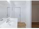 Well-lit bathroom vanity with a bright white sink and a window for natural light at 2313 Van Patten Pl, Las Vegas, NV 89104