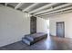 Secure carport area with decorative metal door and access to additional storage or utility rooms at 2313 Van Patten Pl, Las Vegas, NV 89104