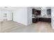 Bright living room flows into the kitchen with updated cabinetry and appliances at 2313 Van Patten Pl, Las Vegas, NV 89104