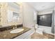 Elegant bathroom featuring marble countertops and a tub at 2385 Via Firenze, Henderson, NV 89044
