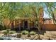 Charming two-story home with covered porch and desert landscaping at 2385 Via Firenze, Henderson, NV 89044