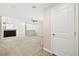 Bright living room with plush carpeting and lots of space at 2385 Via Firenze, Henderson, NV 89044