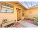 Cozy front porch featuring seating, decorative touches, and a charming entryway at 2426 La Pluma St, Henderson, NV 89014