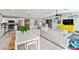 Open-concept living space seamlessly connects kitchen to living room with modern decor at 2426 La Pluma St, Henderson, NV 89014