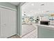 Bright, open-concept living space featuring a seamless transition between the living room, dining area, and kitchen at 2426 La Pluma St, Henderson, NV 89014