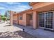 Welcoming single-story home with desert landscaping, a covered entryway, and a security camera at 2537 Seascape Dr, Las Vegas, NV 89128