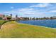 Tranquil view of the community lake with lush landscaping at 2537 Seascape Dr, Las Vegas, NV 89128