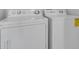 Laundry room features a white dryer and washing machine with easy-to-use controls at 2537 Seascape Dr, Las Vegas, NV 89128