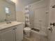 Bathroom featuring a vanity, toilet, shower and bathtub at 256 Winona Ter, Henderson, NV 89015