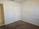 Bedroom features brown carpet, white walls, door and window at 256 Winona Ter, Henderson, NV 89015