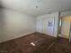 Empty bedroom with carpet flooring, closet and access to another room at 256 Winona Ter, Henderson, NV 89015