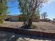 Quaint single-story home featuring a desert-style xeriscaped front yard for low maintenance at 256 Winona Ter, Henderson, NV 89015