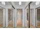 Stylish bathroom with mirrored sliding doors, offering an abundance of storage and privacy at 2732 Heritage Ct, Las Vegas, NV 89121