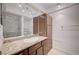 Bathroom with granite vanity and updated lighting over sink at 2732 Heritage Ct, Las Vegas, NV 89121
