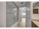 Bathroom with tile surround and glass doors at 2732 Heritage Ct, Las Vegas, NV 89121