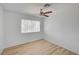 Bedroom featuring wood-style flooring and a ceiling fan at 2732 Heritage Ct, Las Vegas, NV 89121