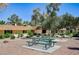 Exterior shot of a community picnic area with benches and well-maintained landscaping at 2732 Heritage Ct, Las Vegas, NV 89121