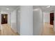 Hallway with wood-style flooring and access to multiple rooms at 2732 Heritage Ct, Las Vegas, NV 89121