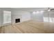 Spacious living room featuring wood floors and a classic fireplace at 2732 Heritage Ct, Las Vegas, NV 89121