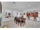 Bright open dining room with views of kitchen and decorative fireplace at 2779 Kindeace Ave, Henderson, NV 89044