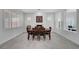 Bright dining room with fireplace provides natural lighting with plantation shutters at 2779 Kindeace Ave, Henderson, NV 89044