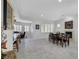 Bright dining room with fireplace and seating for six offers open concept living at 2779 Kindeace Ave, Henderson, NV 89044