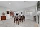 Bright open dining room featuring plantation shutters and decorative fireplace at 2779 Kindeace Ave, Henderson, NV 89044
