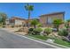Single-story home featuring easy care landscaping, a desert theme, and a warm color palette at 2779 Kindeace Ave, Henderson, NV 89044