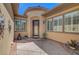 Charming covered front porch featuring decorative accents and lots of natural light at 2779 Kindeace Ave, Henderson, NV 89044