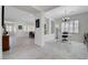 Spacious living room with tile floors, a desk space, and lots of natural light at 2779 Kindeace Ave, Henderson, NV 89044