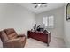 This room offers a ceiling fan, recliner, desk and dual monitors setup, perfect for a home office at 2779 Kindeace Ave, Henderson, NV 89044