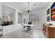 Bright home office space with desk, chair, decorative chandelier, and adjacent sitting room at 2779 Kindeace Ave, Henderson, NV 89044