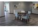 Cozy dining area with a stylish table and chairs set on a hardwood floor at 2851 S Valley View Blvd # 1134, Las Vegas, NV 89102