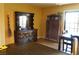 Dining room features dark-wood furniture, hardwood floors and view into kitchen and pantry at 2851 S Valley View Blvd # 1134, Las Vegas, NV 89102