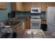 Functional kitchen features essential appliances, ample countertop space, and practical cabinetry at 2851 S Valley View Blvd # 1134, Las Vegas, NV 89102