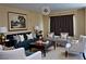 Beautifully decorated living room with plush seating, elegant lighting, and stylish artwork at 2851 S Valley View Blvd # 1134, Las Vegas, NV 89102