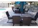 Outdoor dining area with tables and chairs next to the pool, perfect for relaxing at 2851 S Valley View Blvd # 1134, Las Vegas, NV 89102